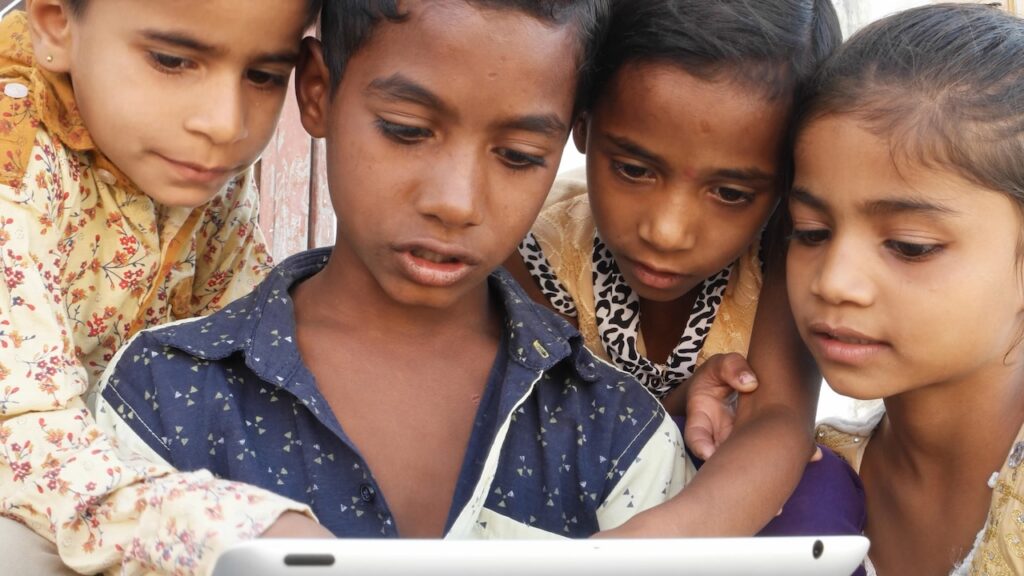 closeup of rural children using a tablet india 2025 02 09 16 08 51 utc